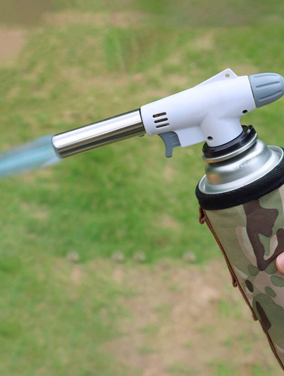 What is the role of a gas torch in outdoor camping?